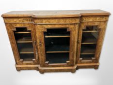 A Victorian figured walnut and satinwood inlaid breakfront credenza,