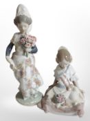 A Lladró figure of a girl holding a bouquet of flowers, and another figure, No. 5869.