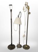 Three Continental patinated metal standard lamps