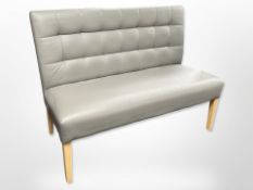 A contemporary grey stitched leather upholstered bench,