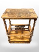 A Victorian figured walnut and satinwood inlaid book table fitted a drawer,