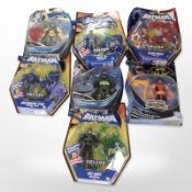 Seven DC Batman figurines, boxed.