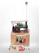 A Mamod steam tractor in box with fuel tablets.