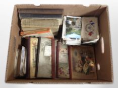 A collection of World War I silk postcards and other later postcards, antiquarian children's books,