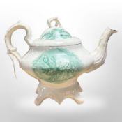 A 19th-century transfer-printed porcelain teapot depicting the polka dance, height 19.5cm.