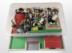 A children's plywood model farm set and collection of animal figures, buildings, etc.