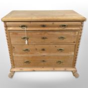 A 19th century Scandinavian pine chest of four drawers, raised on lion paw feet,