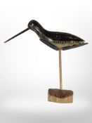 An American shorebird decoy with percussive slate plates to underside to mimic the call of a bird,