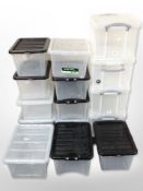 Fifteen plastic storage boxes with lids
