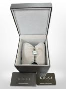 A lady's Gucci stainless steel diamond-set quartz wristwatch, mother of pearl dial, case 14mm,
