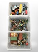 Three crates containing vintage children's toys, die-cast model vehicles,