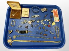 A group of costume jewellery, fob on silk ribbon, chain with coin,