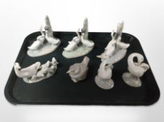 Six Lladró/ Nao goose figures and groups, and a further Lladró figure of a bird.