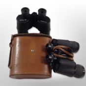 A pair of Soviet Tento binoculars in leather case, and a further pair of Omega 7x50 binoculars.