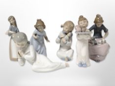 Six Lladró/ Nao figures of children, tallest 18cm.