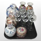 A group of oriental porcelain ginger jars, pair of vases, set of eight drinking glasses, etc.