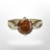 A 9ct yellow gold ring set with synthetic stones, size N/O. CONDITION REPORT: 2.9g.