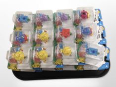 24 Mr Men keychains, boxed.