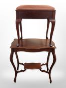 A reproduction mahogany two-tier occasional table,
