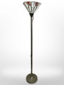 An uplighter with a Tiffany-style shade, height 172cm.