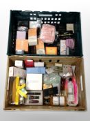 A collection of cosmetics and fragrances.