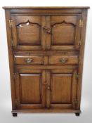A Chapman's Siesta oak cupboard,
