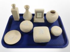 A group of Wedgwood yellow ground Jasperware cabinet china.