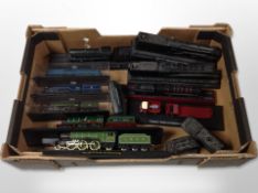 A group of plastic model locomotives on plinths, including Corgi examples,