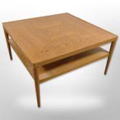 A 20th century Danish oak two tier square coffee table,