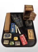 A miniature marquetry-inlaid smoker's cabinet, gramophone needle tins, an oriental hand fan,