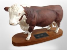 A Beswick Connoisseur Polled Hereford Bull on plinth, length 30cm.