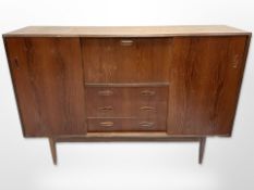 A 20th century Danish teak sliding door sideboard,