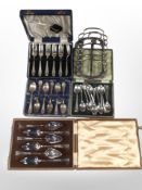 A group of boxed cutlery sets including grapefruit spoons, cutlery sets etc,