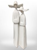 A Lladró figure of two nuns, height 32cm.