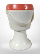 A 1970's Flair plastic sewing box/stool with swing handle,