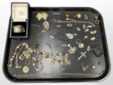 A group of antique and later costume jewellery, silver napkin ring,