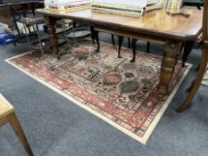 A machine made rug of Caucasian design,