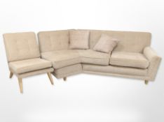 A Danish corner settee and matching armchair in buttoned upholstery