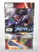 Three Hasbro Disney Star Wars figures, Tie Fighter and Tie Striker, boxed.