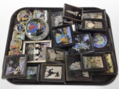 A collection of butterfly wing pictures, compacts, etc.