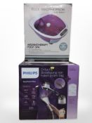 A boxed clothes steamer and footspa