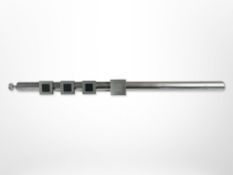 A Bang & Olufsen BeoTime 'flute' alarm wall clock, length 40cm.