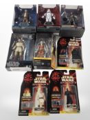 Three Disney Store Star Wars figurines, two further Black Series figurines,