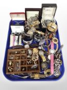 A collection of costume jewellery including bangles, cufflinks, bead necklaces,