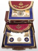 Two brown leather briefcases containing Masonic regalia.