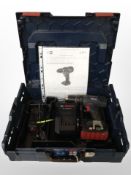 A Bosch cordless drill driver in case with charger,