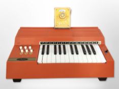 A Magnus Major electric chord organ,