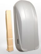 A Thule car roof box with key.