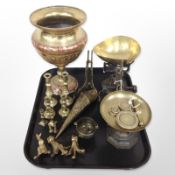 An Indian enamelled brass vase, together with several pairs of candlesticks,