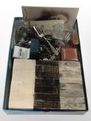 A group of costume jewellery, cutlery, monochrome portrait cards, small tin,